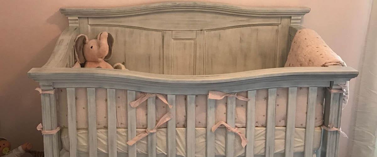 romina baby crib