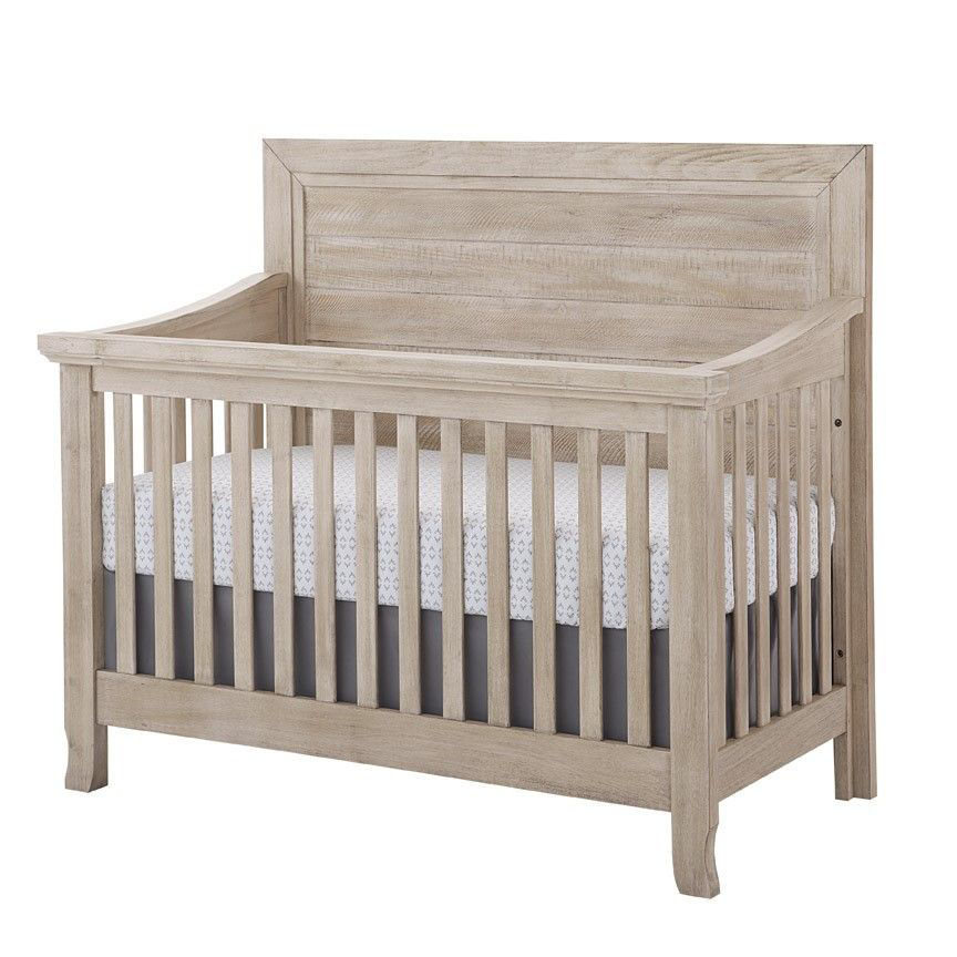 crib on top of bed