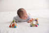 Picture of Triangle Clutching Toy - by Plan Toys