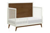 Picture of Palma 4-n-1 Crib - Warm White with Natural Walnut accents - by Babyletto