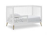 Picture of 3-In-1 Crib with Acrylic spindles in Bianca White with Melted Bronze feet + Toddler conversion kit - from Delta